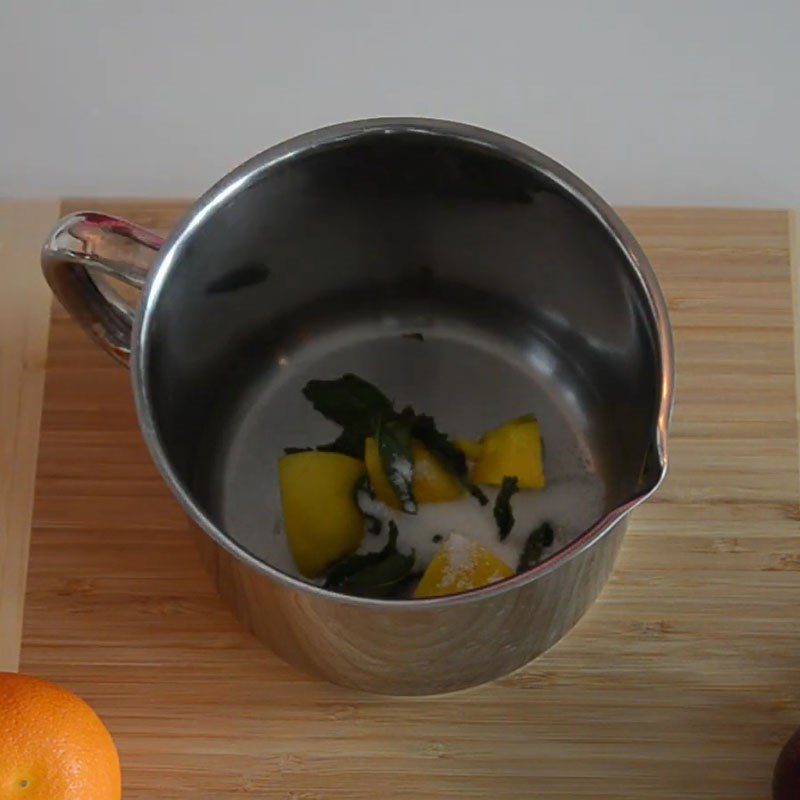 Step 3 Crush lime and mint Plum Punch