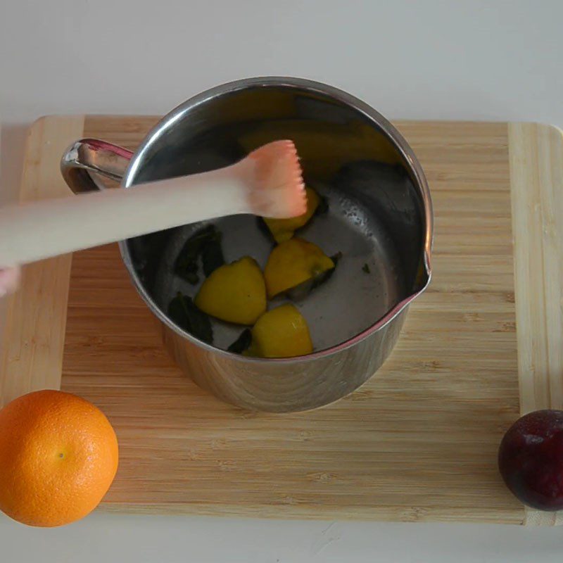 Step 3 Crush lime and mint Plum Punch