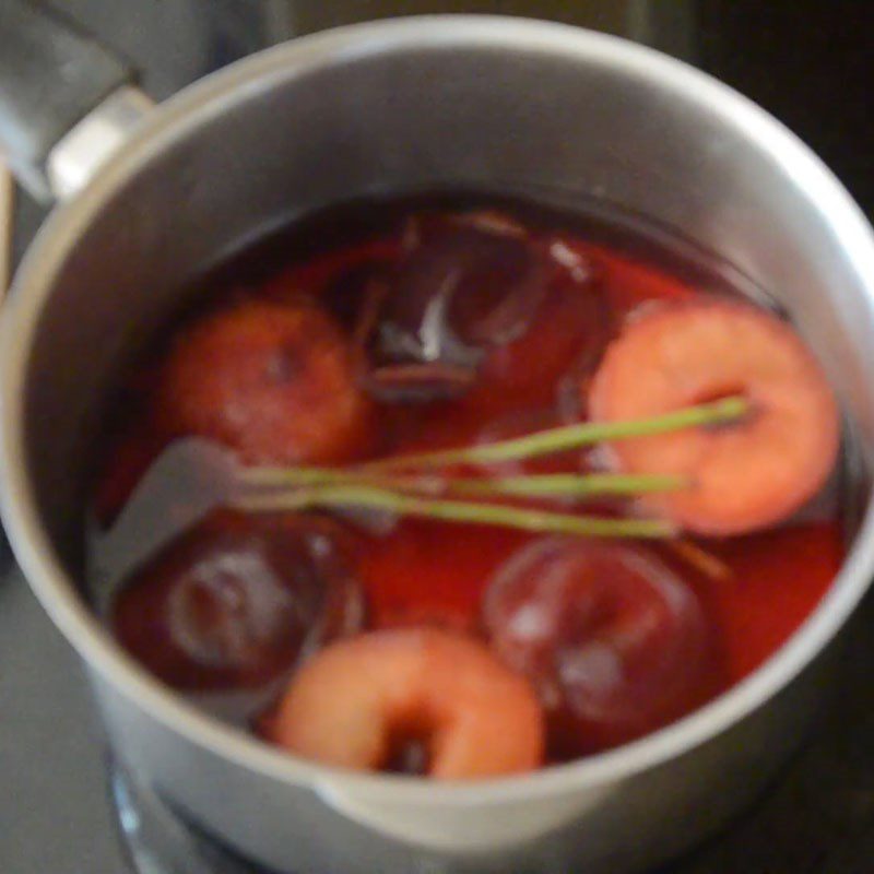 Step 2 Mash the plums Plum Punch