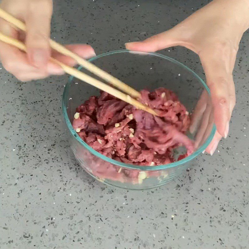 Step 1 Prepare and Marinate the Beef for Garlic Stems Stir-fried with Beef