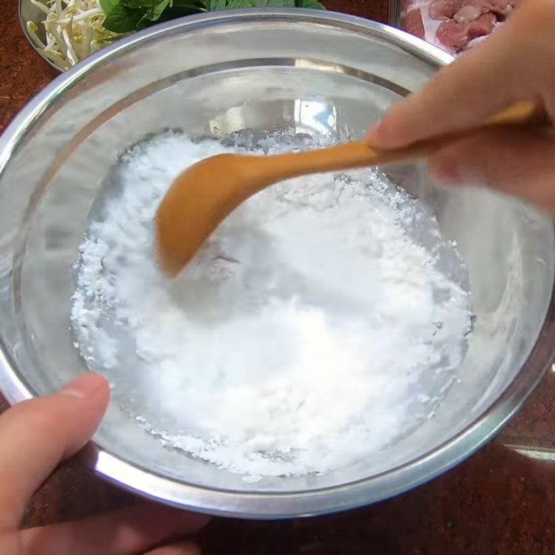 Step 1 Prepare the dough for grilled meat rice rolls