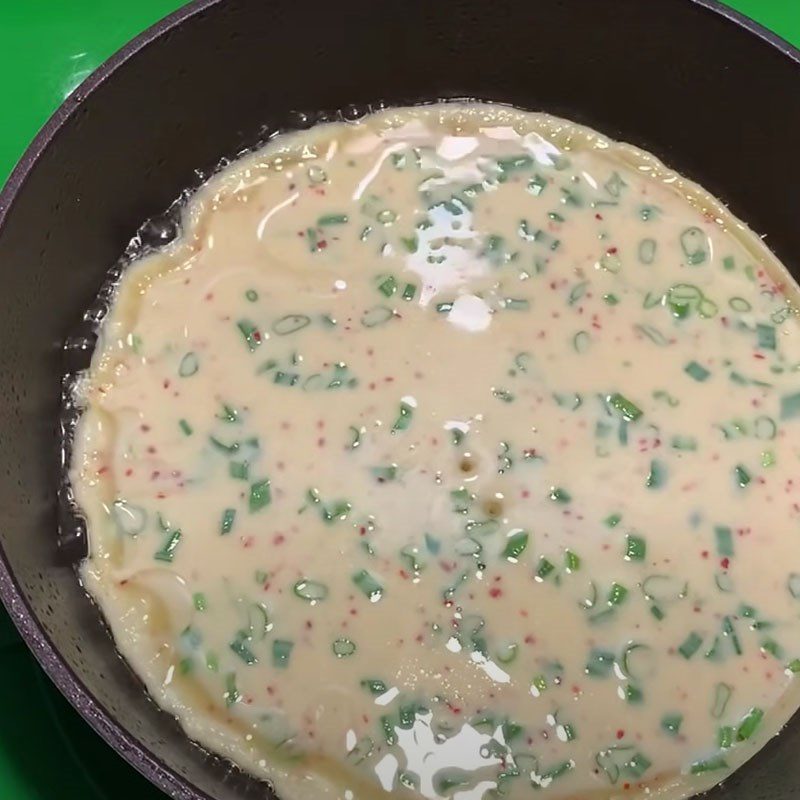 Step 4 Fry the cake Fried flour cake with onion