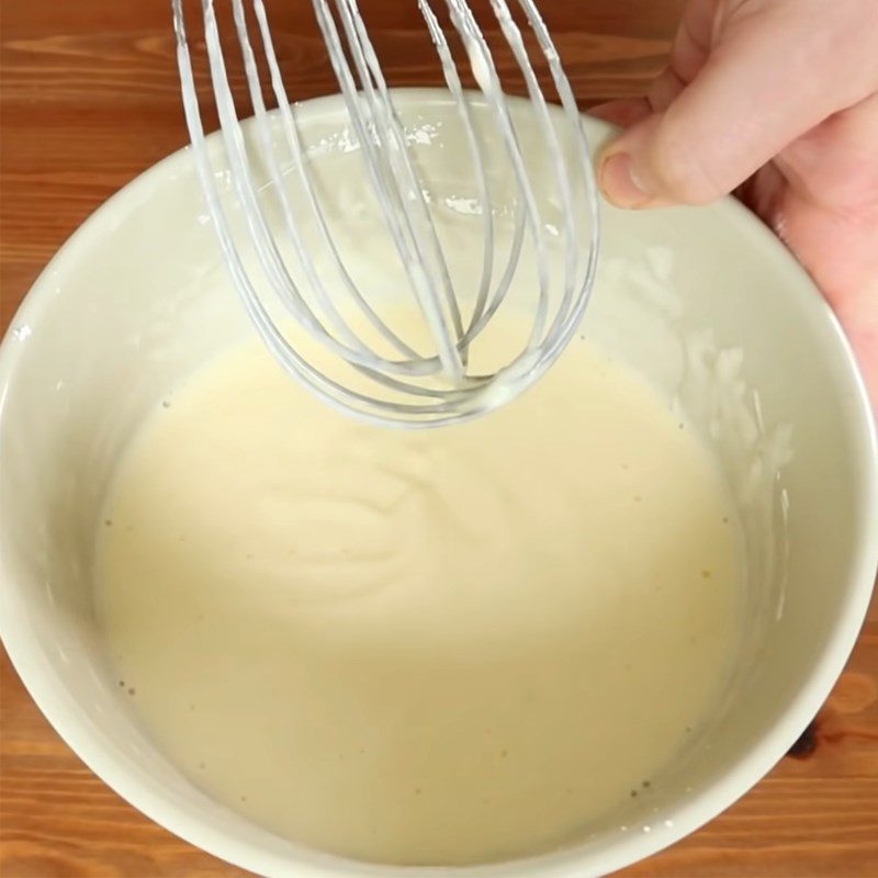 Step 2 Sift and mix corn flour with yogurt mixture Baked yogurt cake