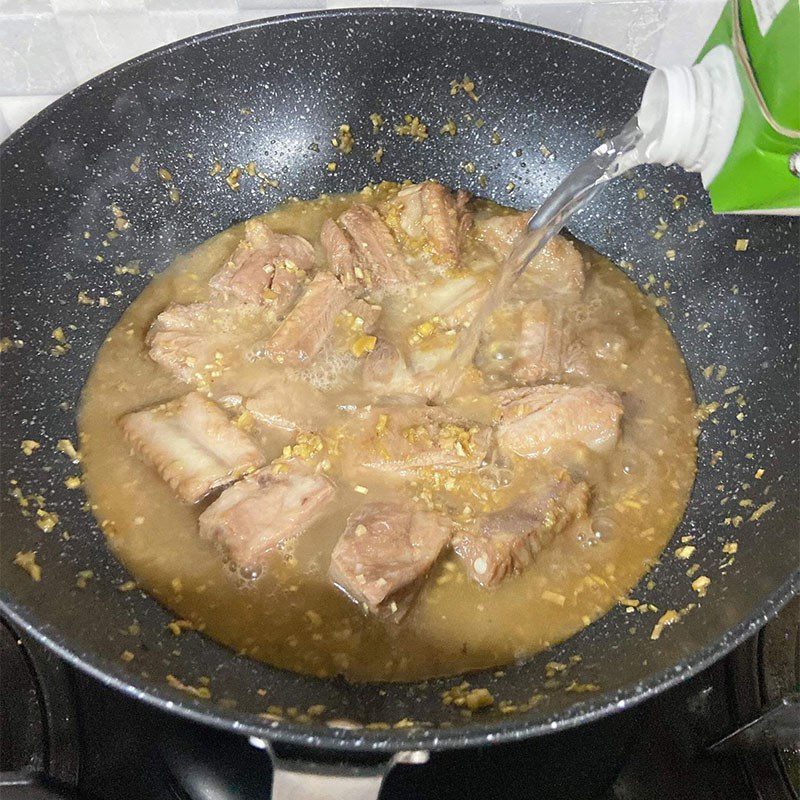 Step 3 Braised ribs with coconut water Tender ribs braised with honey and coconut water