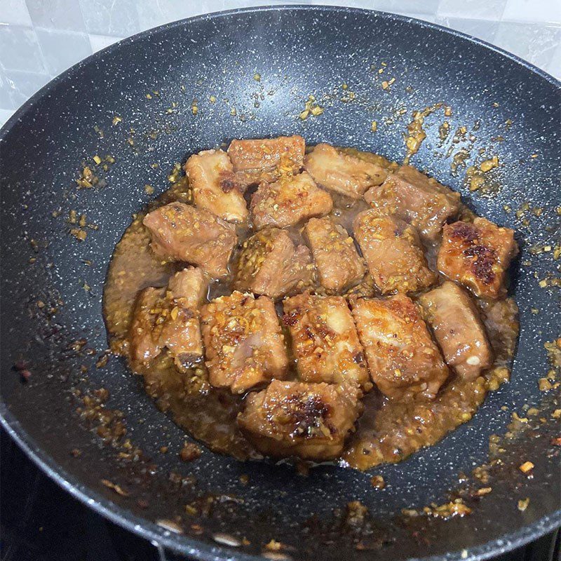 Step 3 Braised ribs with coconut water Tender ribs braised with honey and coconut water