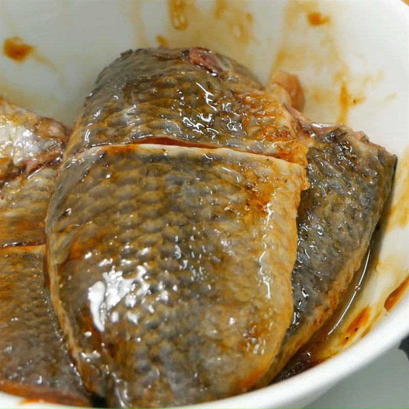 Step 1 Prepare and marinate snakehead fish Braised snakehead fish