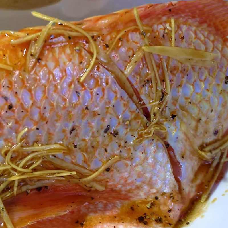 Step 2 Preparing and marinating fish Red tilapia steamed with five spices