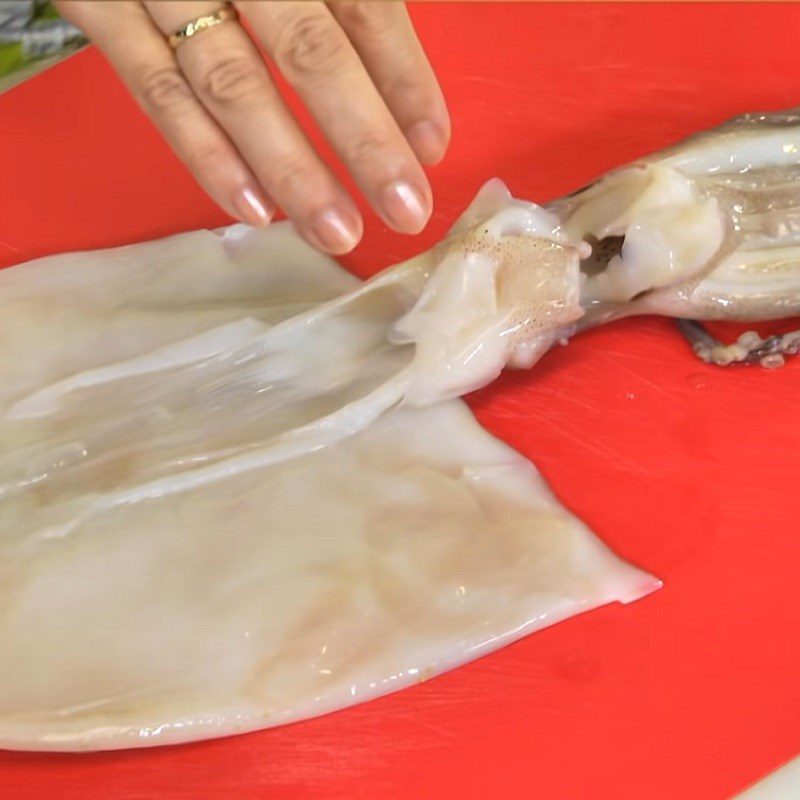 Step 1 Prepping and marinating the squid for Spicy Grilled Green Mango Salad