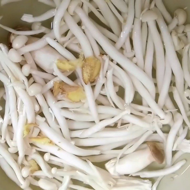 Step 1 Prepare mushrooms for vegetarian nem thinh from enoki mushrooms