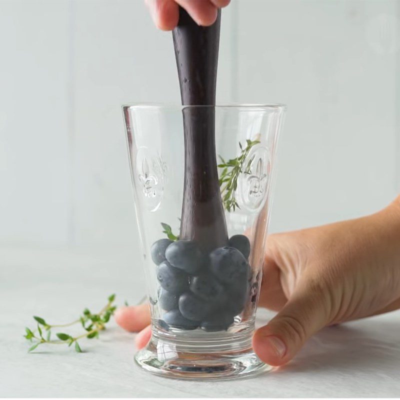 Step 1 Prepare and mash the ingredients for Blueberry Gin Tonic with Thyme