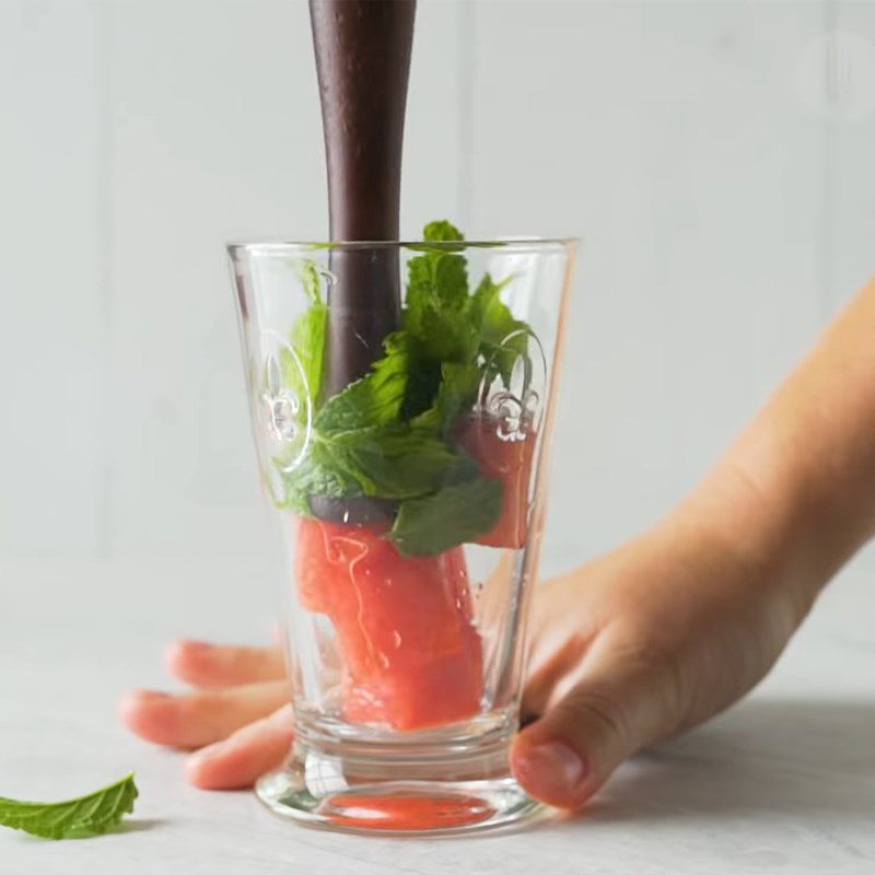 Step 1 Prepare and muddle the ingredients for Watermelon Mint Gin Tonic