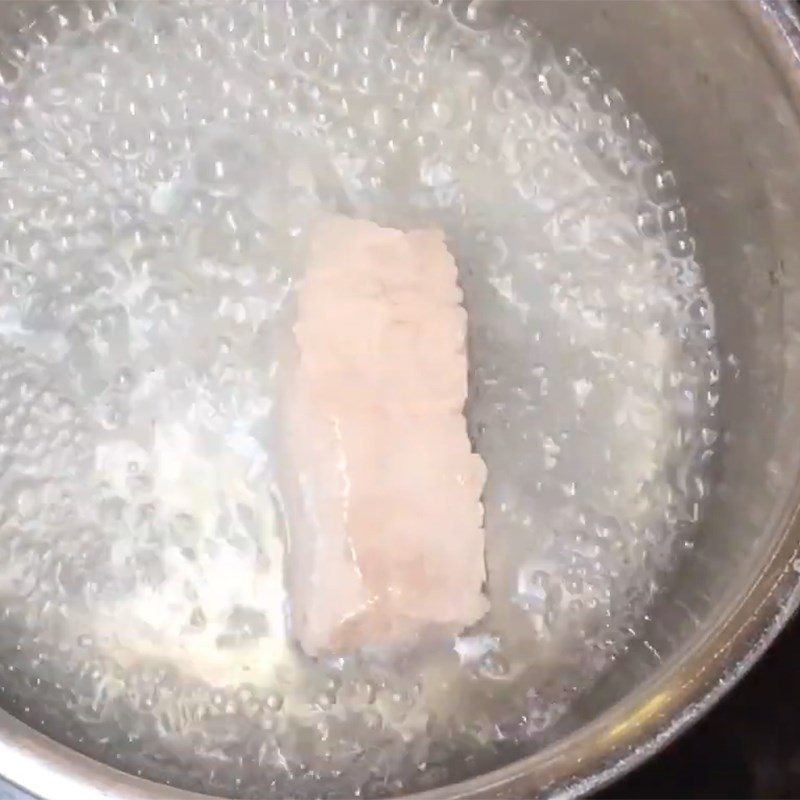 Step 1 Prepare and boil the meat for Pork and Malabar Spinach Porridge