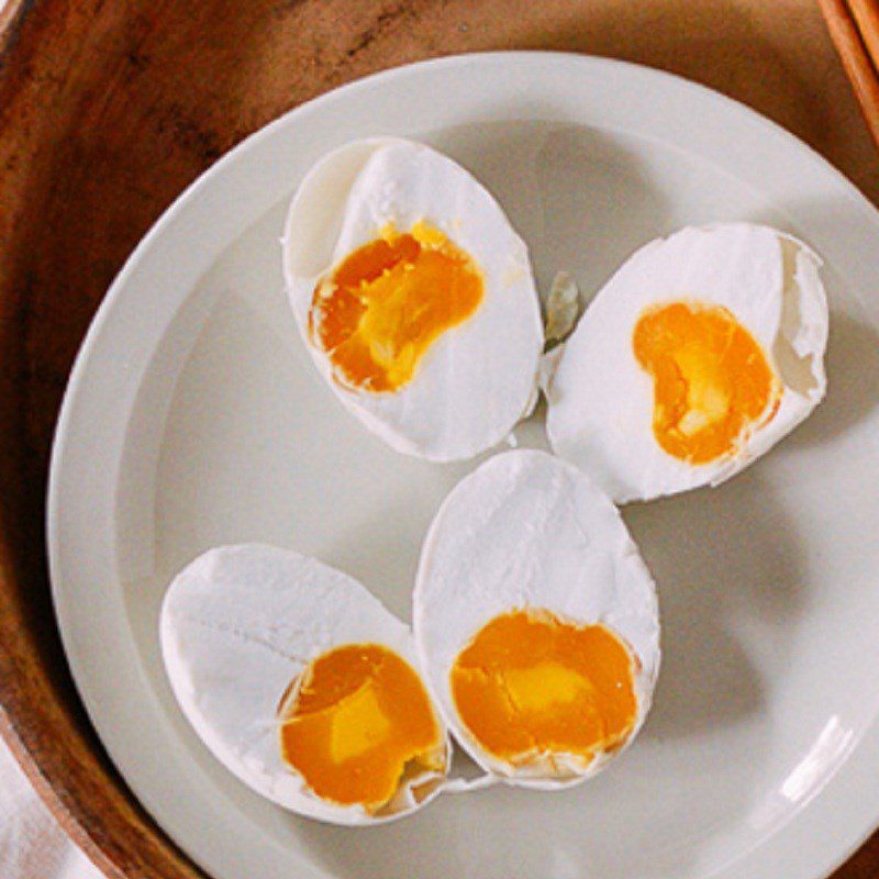 Step 2 Prepare and boil salted eggs Salted egg stir-fried long beans