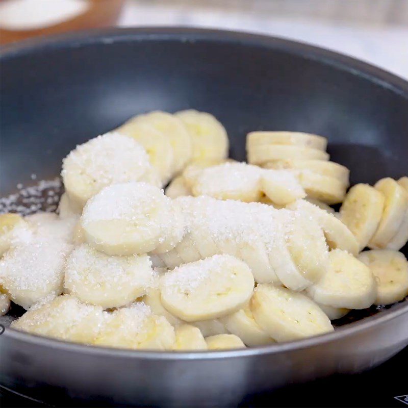 Step 1 Prepare and sauté the bananas Baked Banana Cake using a rice cooker