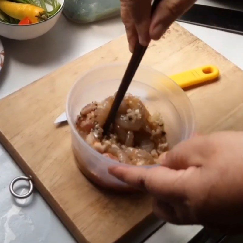 Step 1 Prepare and marinate the shrimp for Green Banana Soup