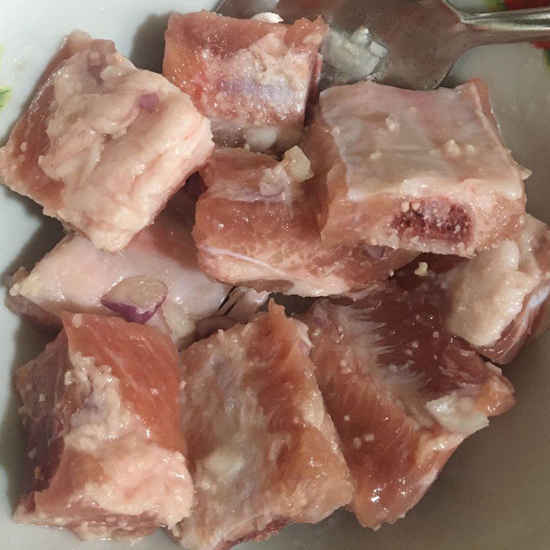 Step 1 Prepare and marinate the pork bones for Pumpkin Soup