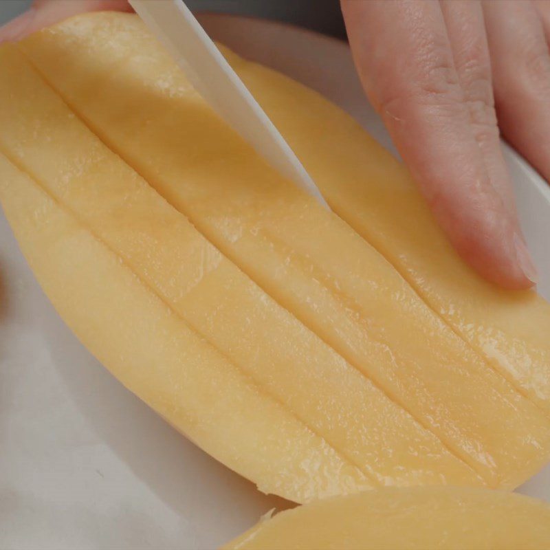 Step 1 Prepare and blend the mango for mango custard stuffed steamed buns