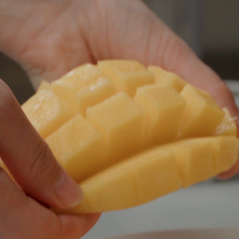 Step 1 Prepare and blend the mango for mango custard stuffed steamed buns