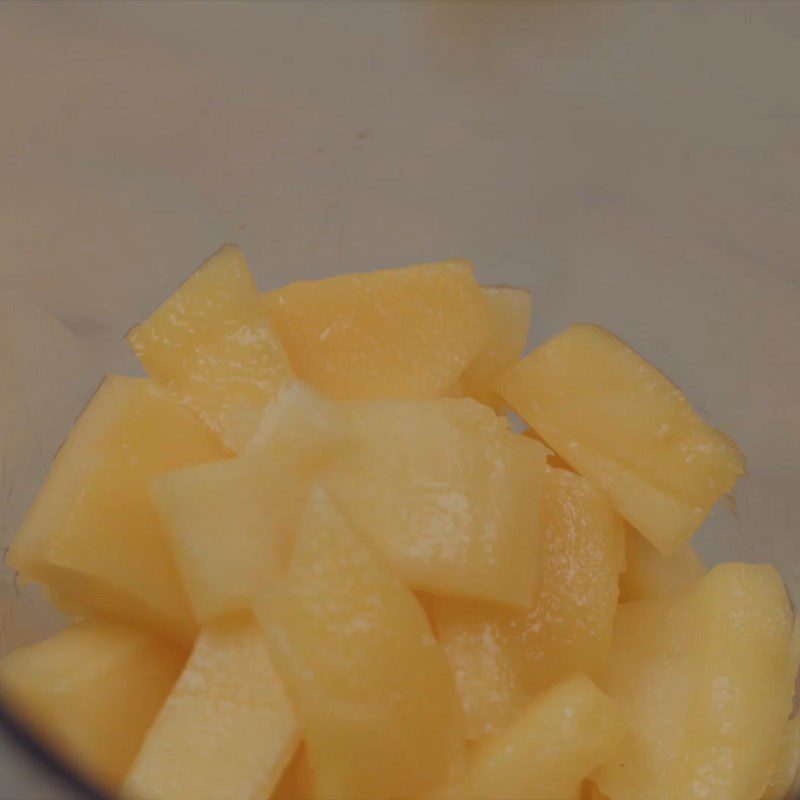 Step 1 Prepare and puree the mango for mango custard buns