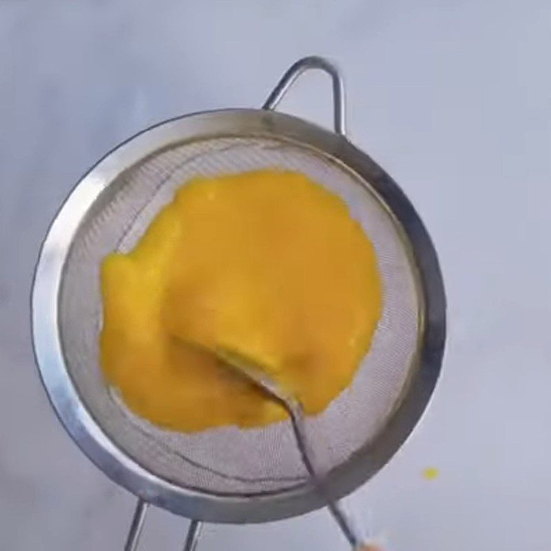 Step 1 Prepare and blend mango for baby custard