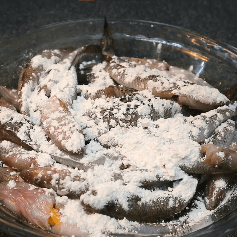 Step 2 Coat Goby Fish with Flour for Fried Goby Fish with Betel Leaves