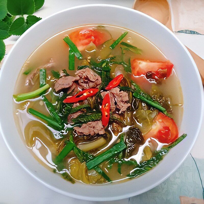 Step 4 Final product Sour melon soup with beef and tần vegetables