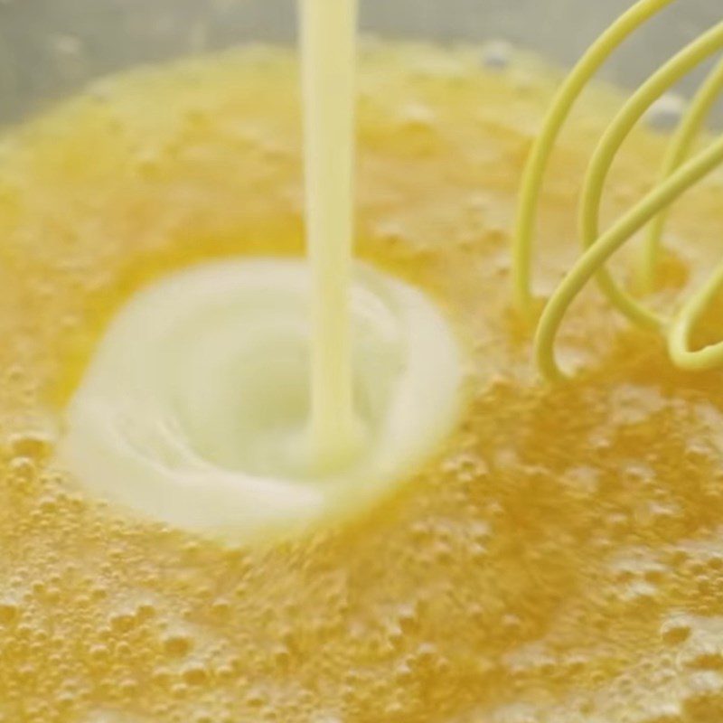 Step 1 Mix the egg and sugar mixture for Strawberry Madeleine