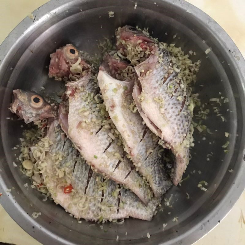 Step 2 Marinate the fish for Fried Salted Tilapia with Lemongrass and Chili