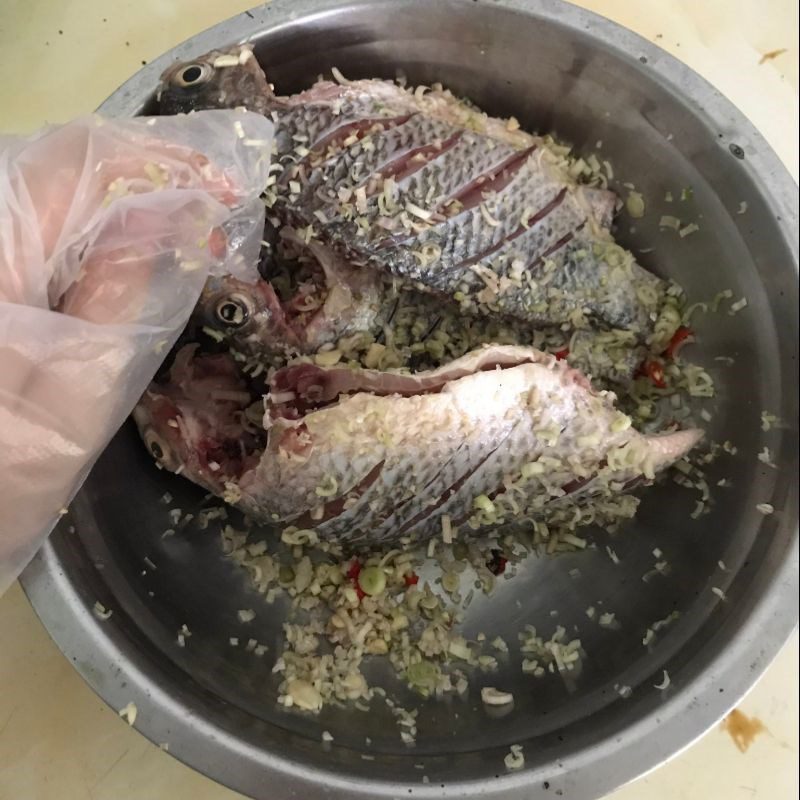 Step 2 Marinate the fish for Fried Salted Tilapia with Lemongrass and Chili