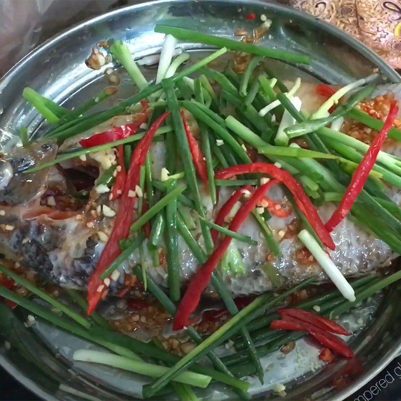 Step 2 Marinating fish Catfish with onion steaming