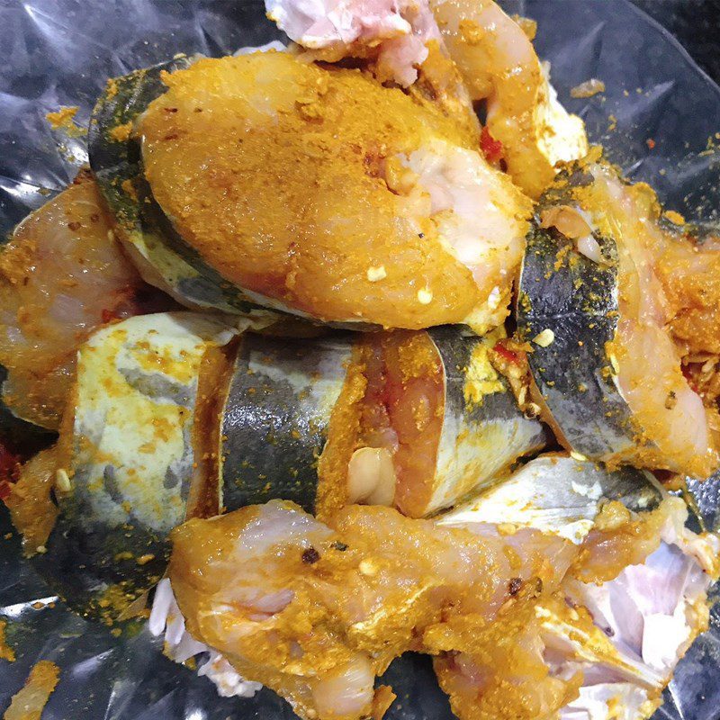 Step 2 Marinate the fish Braised catfish with ginger, turmeric, and lemongrass