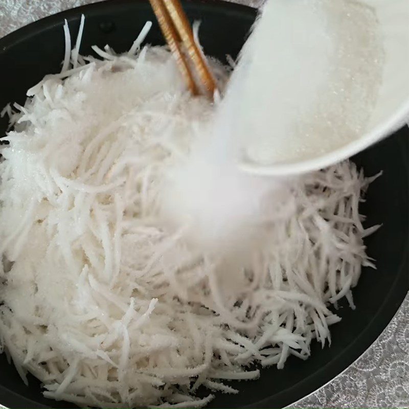 Step 2 Marinate sugar and stir-fry coconut filling Coconut cake with coconut filling