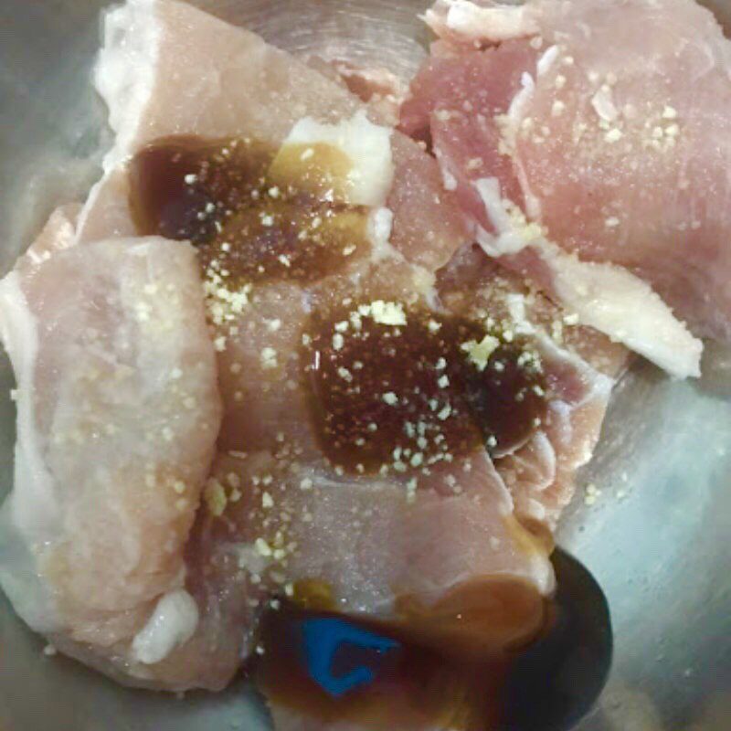 Step 2 Marinate the meat for Cheese-Stuffed Pork Chops using an air fryer