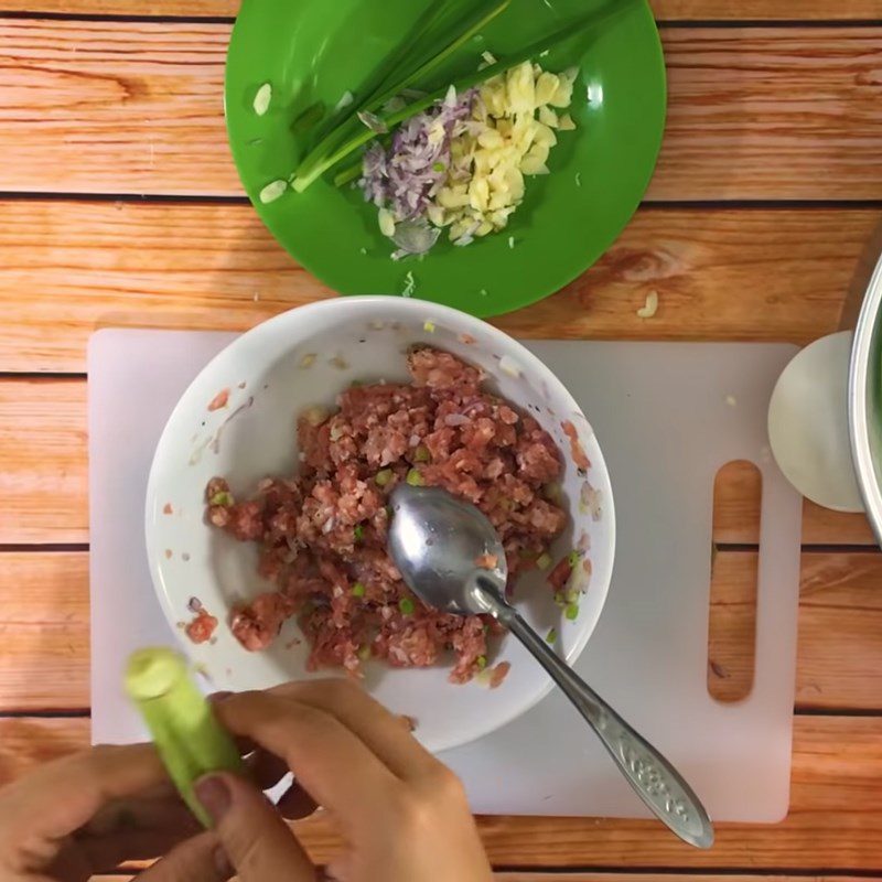 Step 2 Marinate the meat and stuff the okra Steamed meat okra