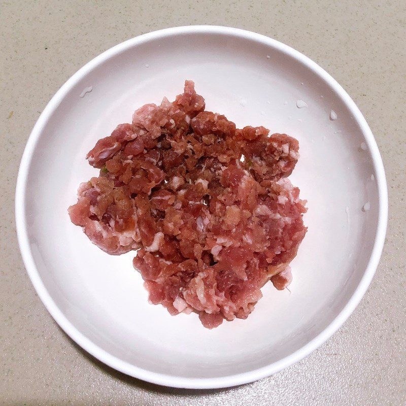 Step 2 Marinate and stir-fry meat Tofu with minced meat sauce