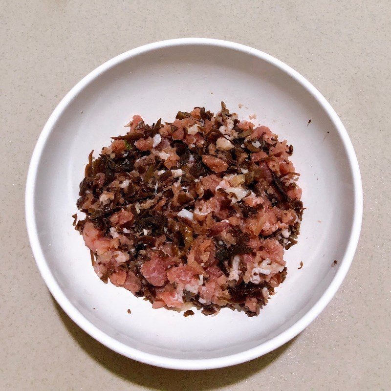 Step 2 Marinate and stir-fry meat Tofu with minced meat sauce