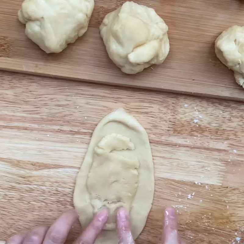 Step 6 Filling and Rolling the Dough for Layered Mooncake with Sticky Rice and Braised Meat