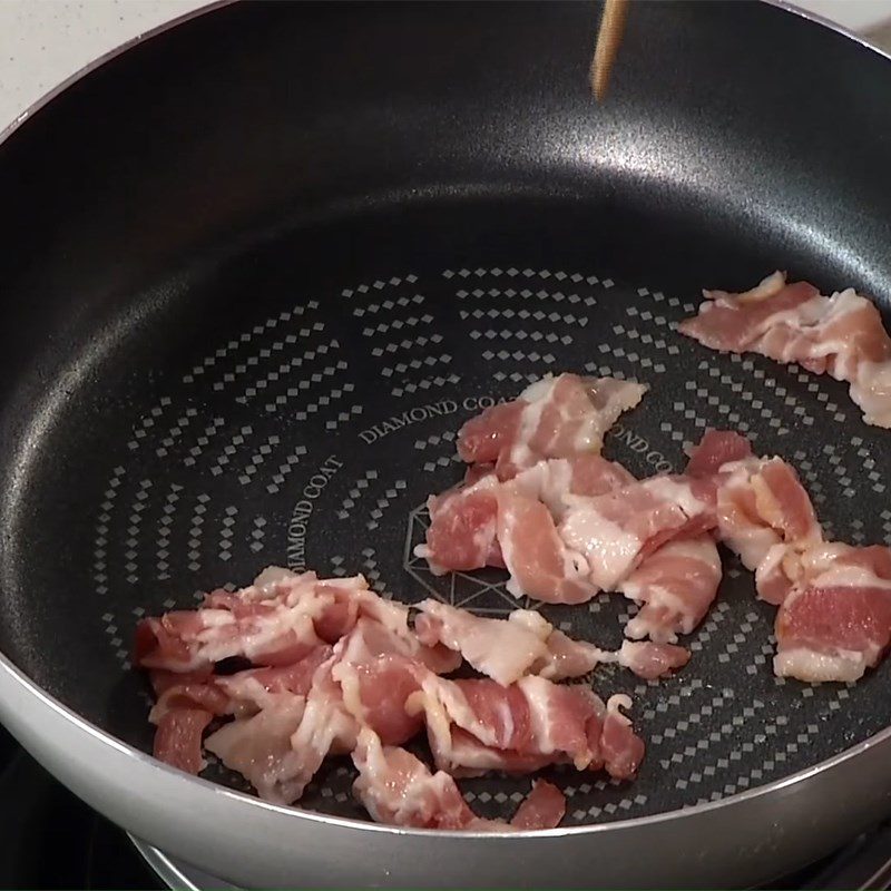 Step 4 Stir-fried pumpkin and meat Stir-fried pumpkin with smoked meat