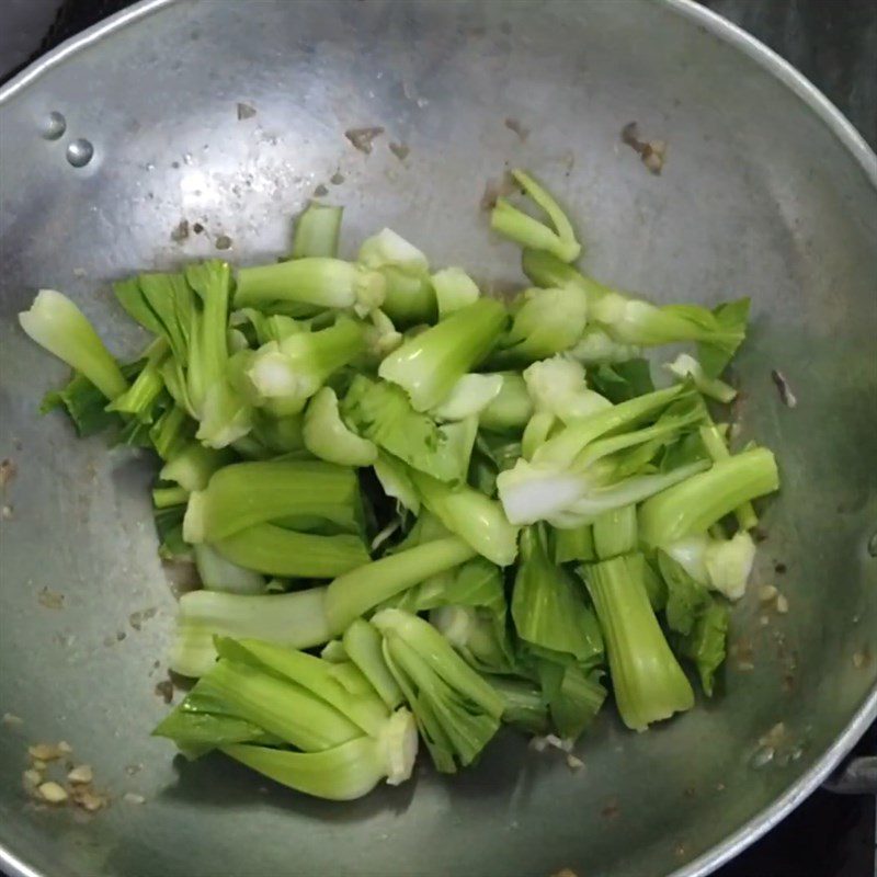 Step 4 Stir-frying the ingredients Stir-fried bok choy with beef