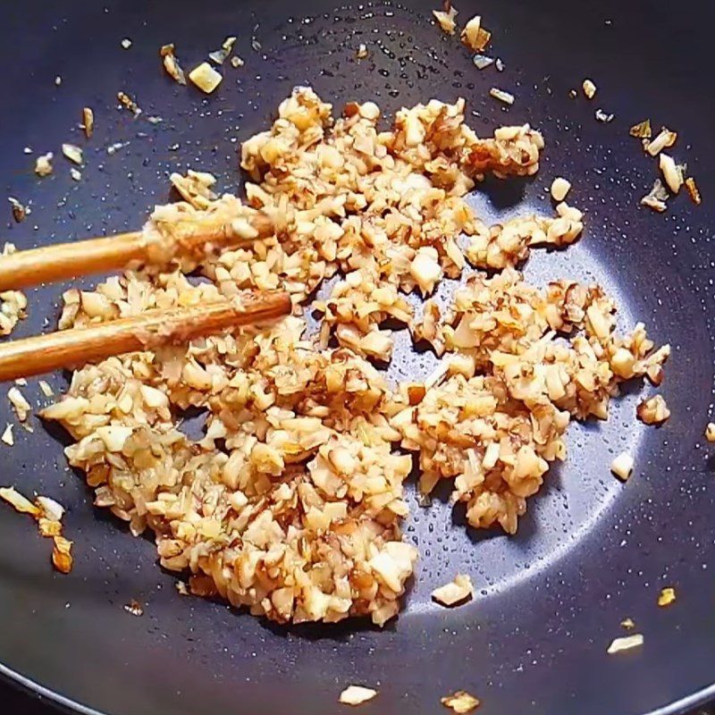 Step 2 Stir-frying Mushrooms for Stir-fried Salt and Chili Mushrooms