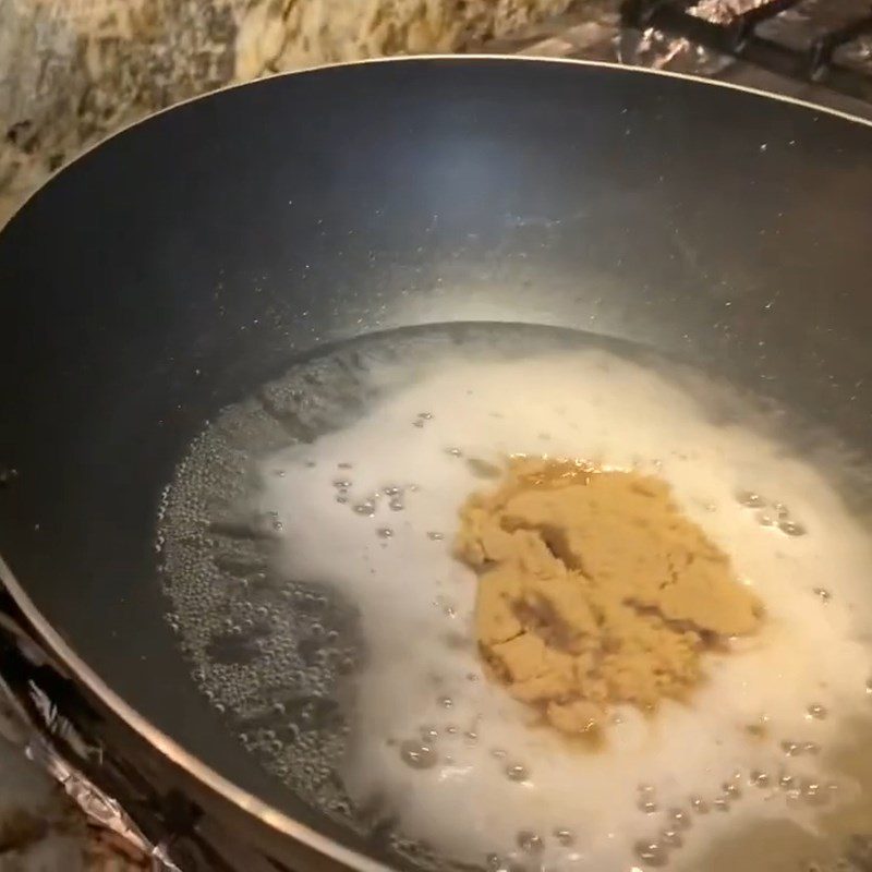 Step 2 Stir-frying Sticky Rice with Coconut Milk for Bánh Tét with Green Bean Filling