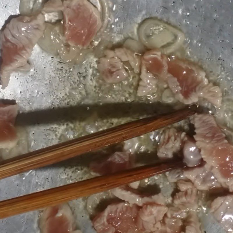 Step 2 Sauté ingredients for sour cabbage soup with pork