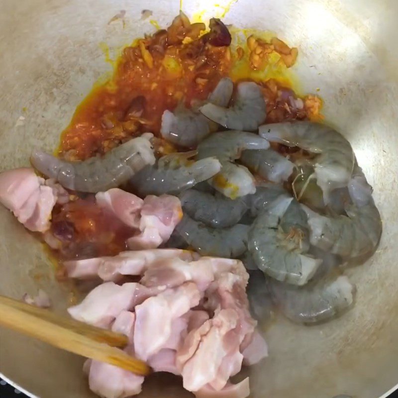 Step 2 Stir-frying shrimp and pork filling for Banana Leaf Tapioca Cake