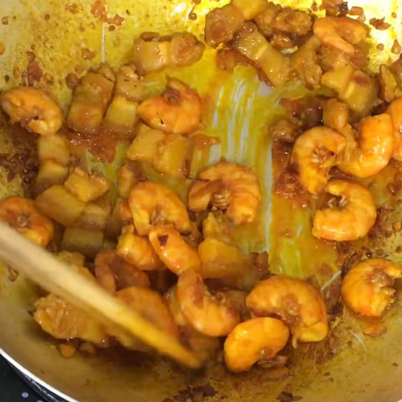 Step 2 Stir-frying shrimp and pork filling for Banana Leaf Tapioca Cake