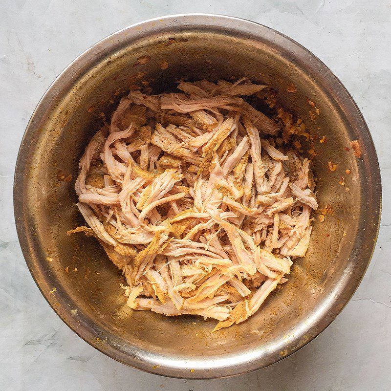 Step 3 Shred and marinate the meat for Spicy Sour Plum Dried Pork