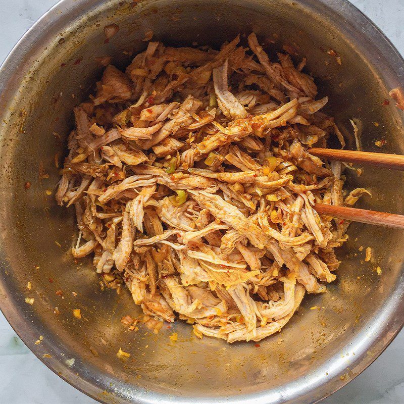 Step 3 Shred and marinate the meat for Spicy Sour Plum Dried Pork