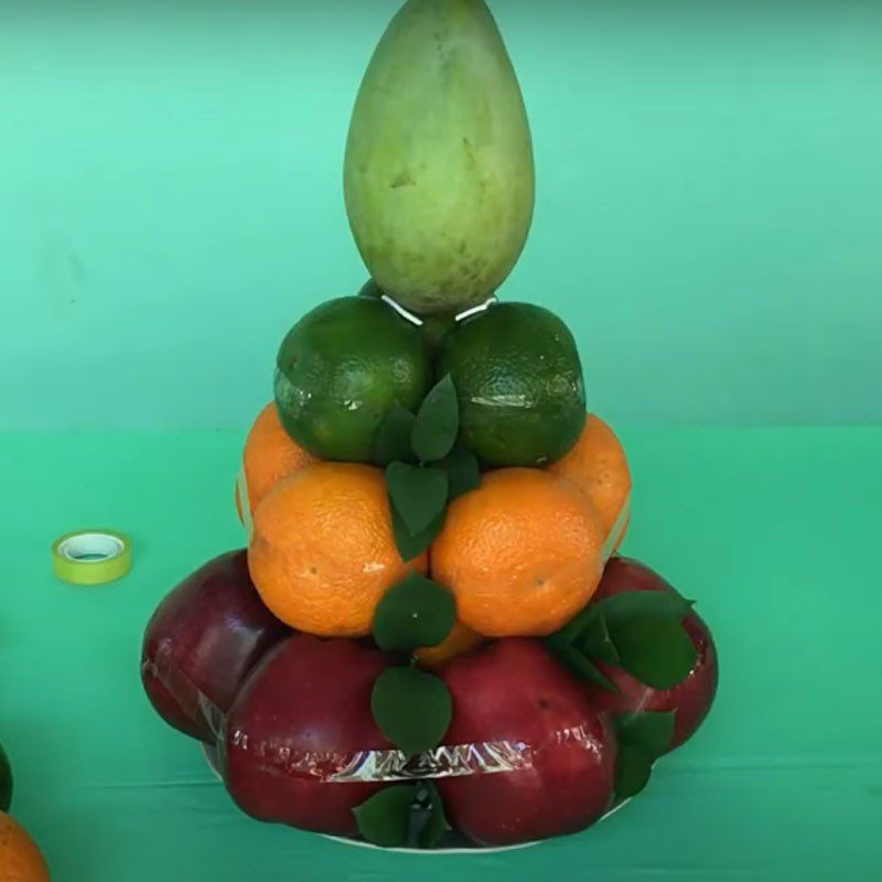 Step 1 Arrange fruits with adhesive tape How to arrange different types of fruits with tape