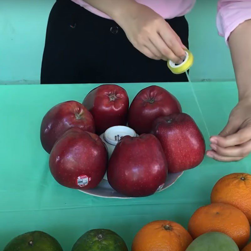 Step 1 Arrange fruits with adhesive tape How to arrange different types of fruits with tape