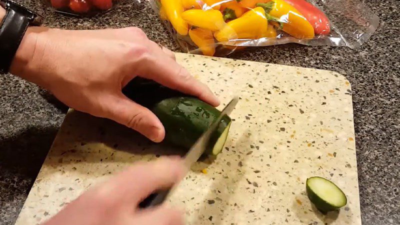 Cut cucumbers into thin slices