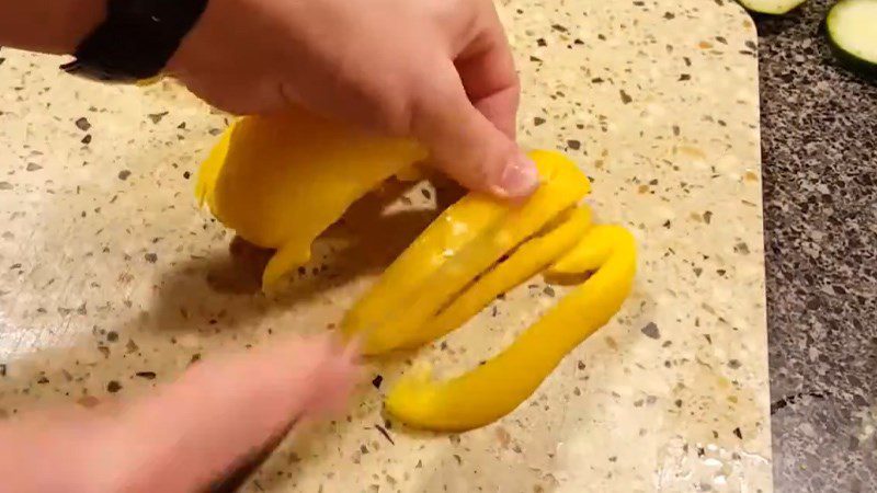 Cut the yellow bell pepper and remove the seeds